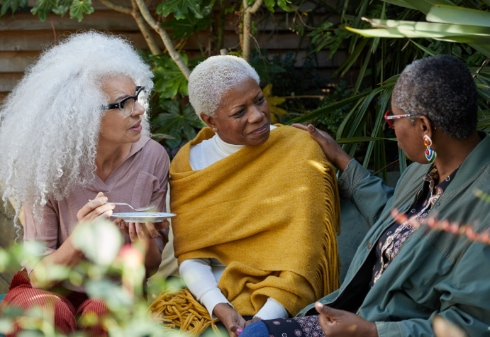 Three black women discussing endometrial cancer risk factors Three black women discussing endometrial cancer risk factors